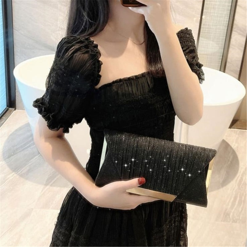 Clutch zwart glitter